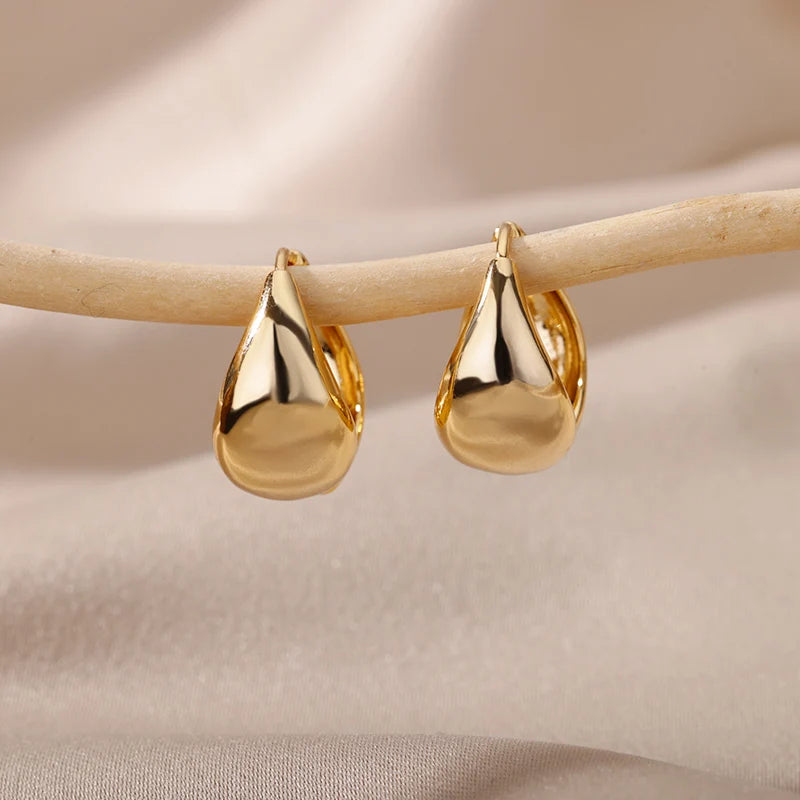 Chunky Oval Gold Huggie Earrings – Smooth Drop Hoops